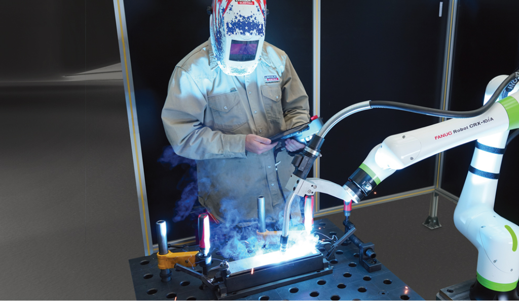 A robot is welding a piece of metal.